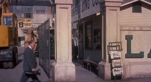 Man Walking Past Elster's Office